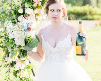 Bride with Veuve Clicquot Champagne Bottle