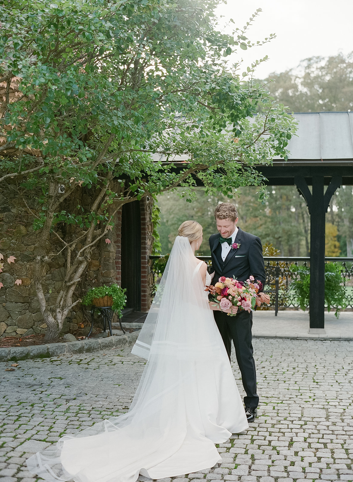 Bride and Groom in courtyard