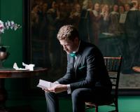 Groom reading letter