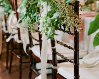 Flowers on back of chairs