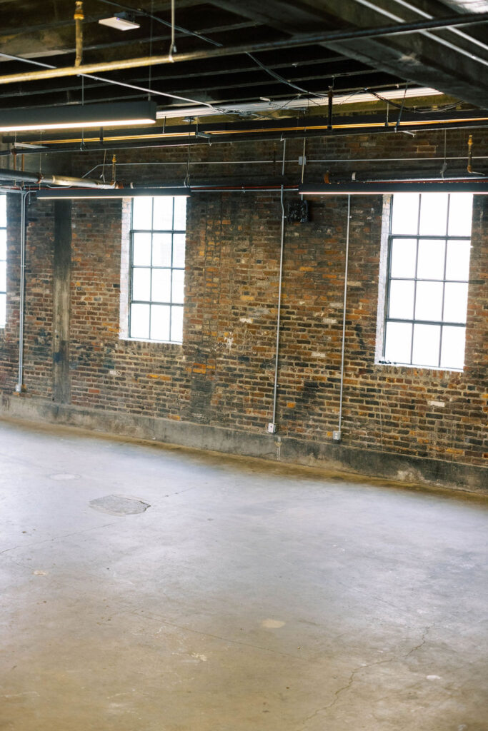  Industrial brick walls and open floors inside Autoshop at Union Market, a modern venue for weddings and mitzvah receptions