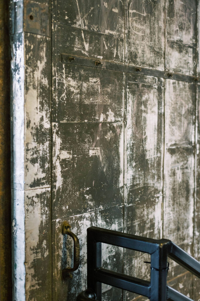 Distressed industrial wall detail at Autoshop in Union Market, Washington D.C., perfect for urban wedding and mitzvah decor