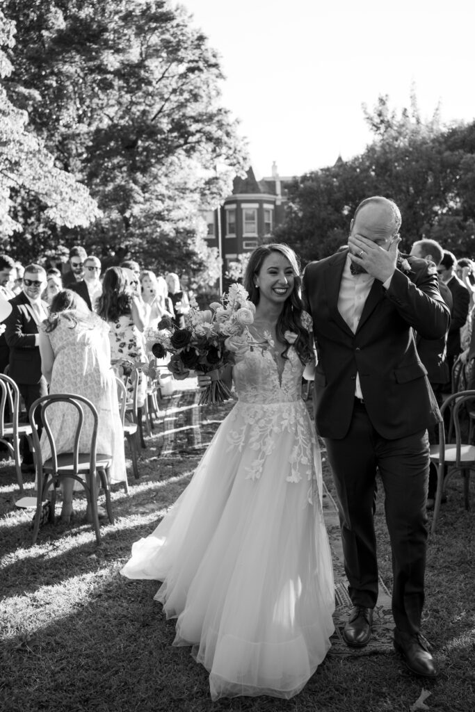 Emotional wedding recessional at The Branch Museum in Richmond, featuring joyful bride and tearful groom Richmond Wedding Planner.