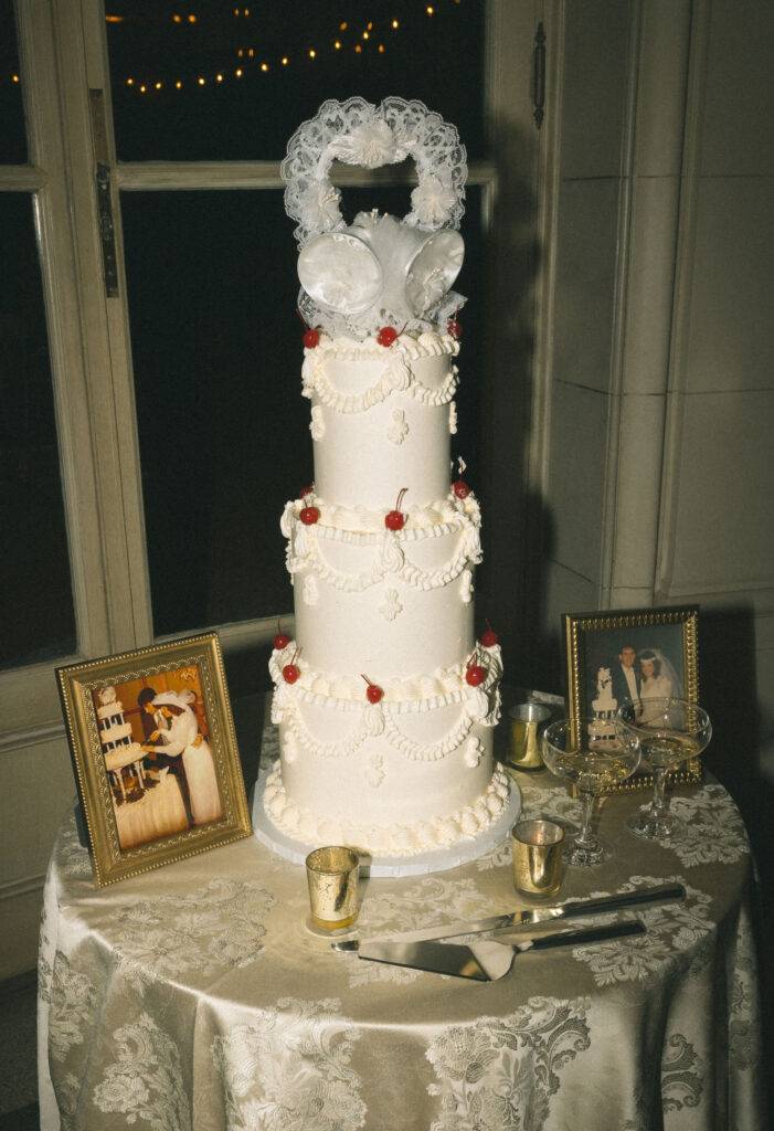 Vintage wedding cake with cherries and family heirloom photos at Meridian House reception in DC