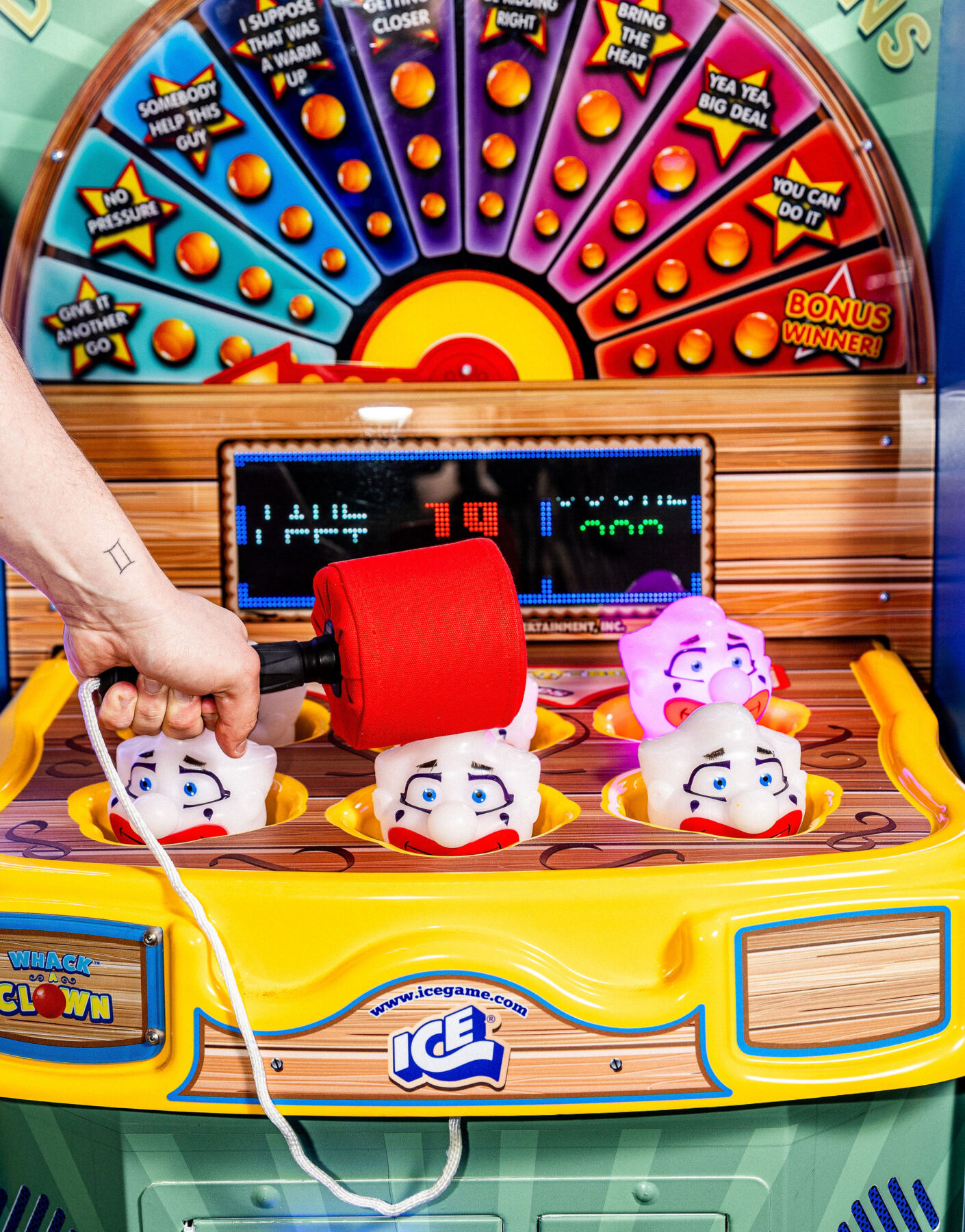 Whack-a-Clown game with bright colors and custom decor at a Bar or Bat Mitzvah at Swingers Carnival in Washington DC