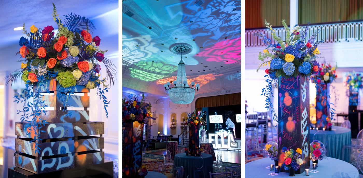 Bold floral arrangements on graffiti-covered pillars for a bat mitzvah at The Jefferson Hotel