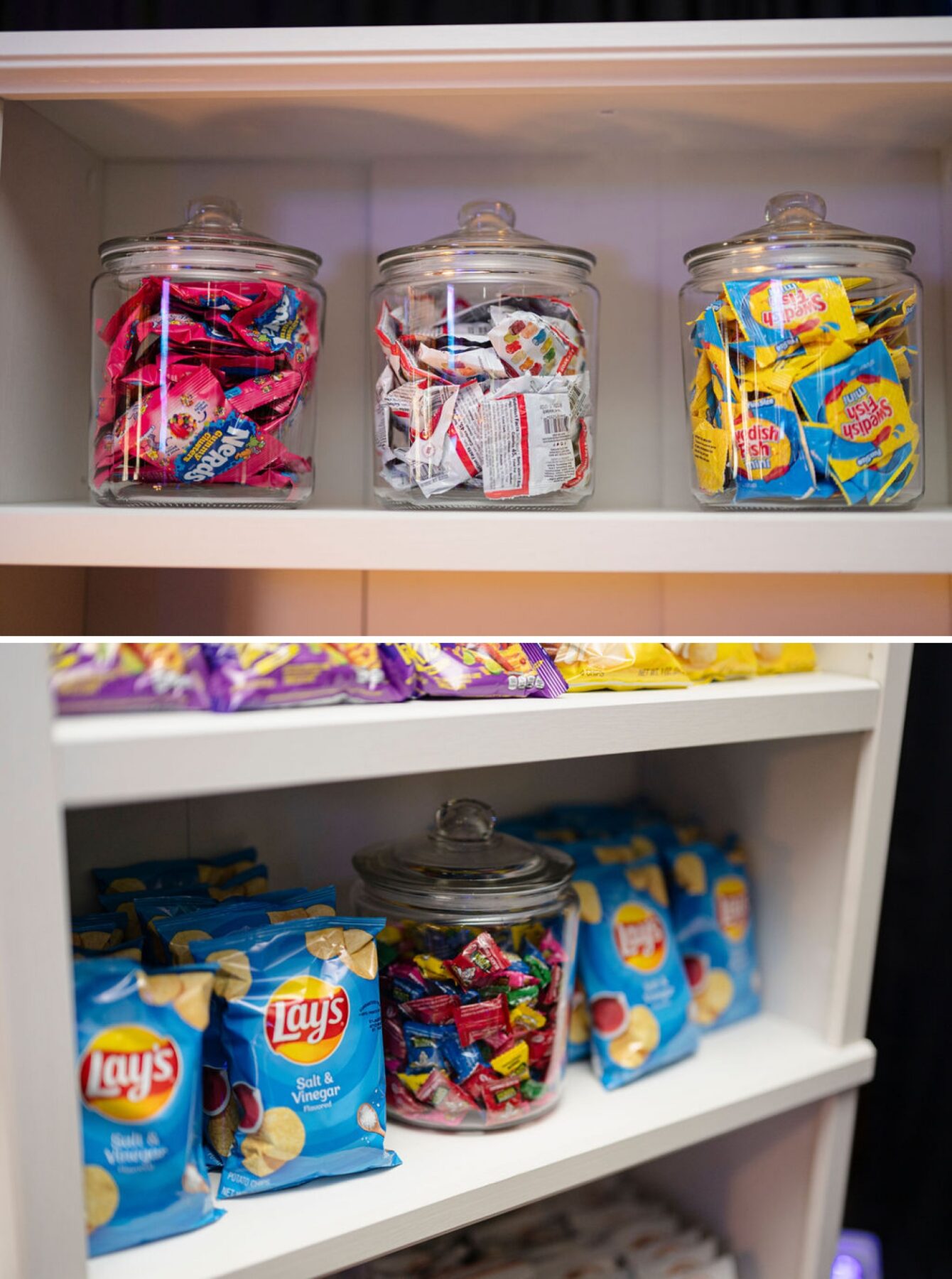 Chips and candy displayed like a snack bar at an arcade-themed Bar Mitzvah
