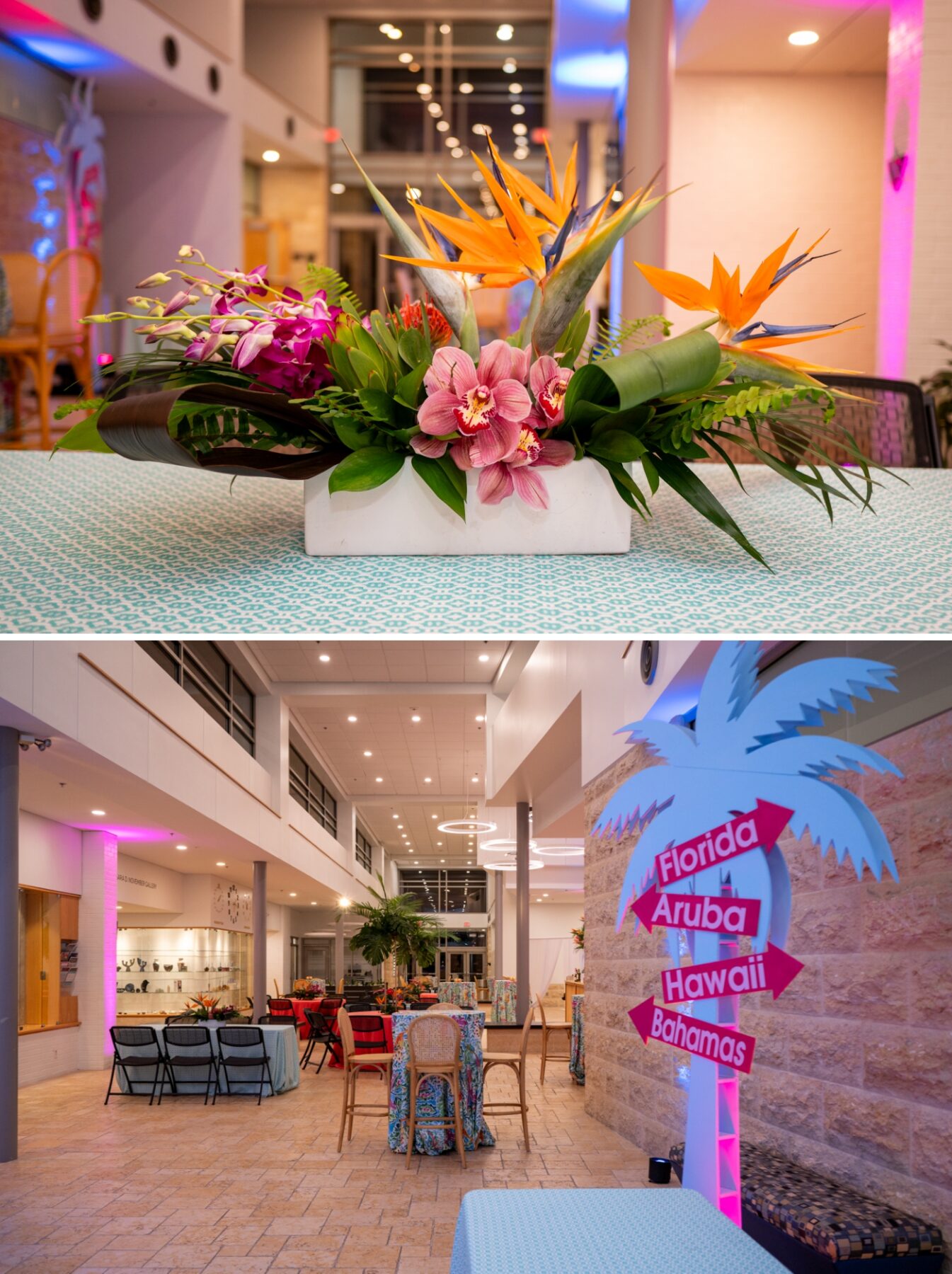 A large tropical floral centerpiece on a blue tablecloth