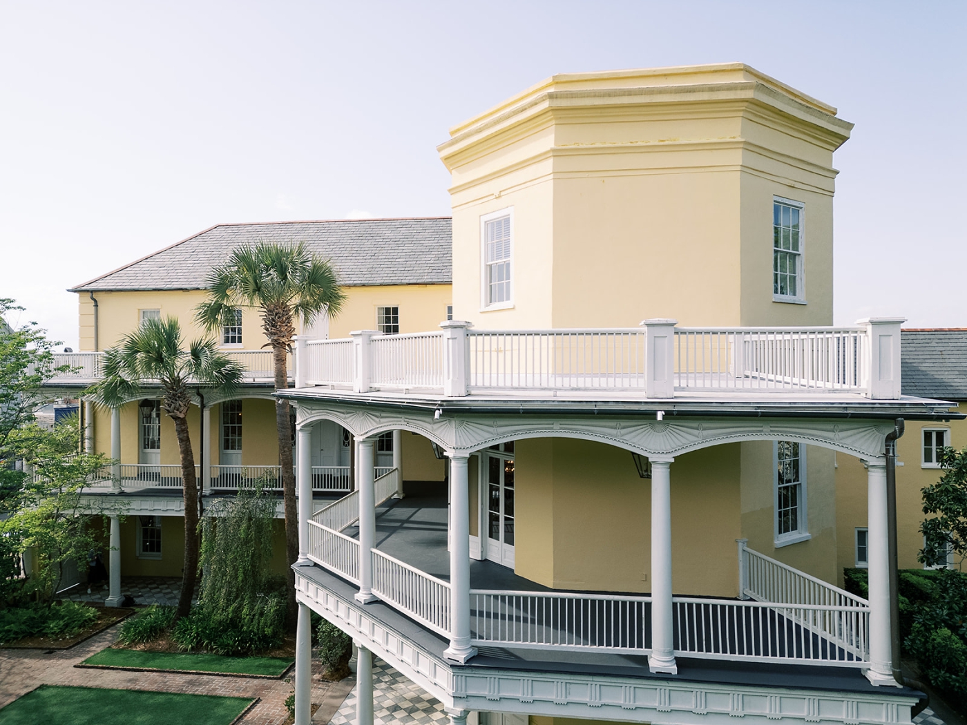 A view of the double balconies wrapping around a hexagonal wing of the William Aiken House in Charleston, South Carolina